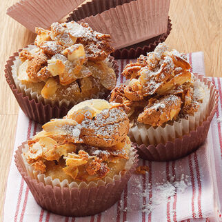Bananen-Muffins mit Amaretti-Haube Bananen-Muffins mit Amaretti-Haube