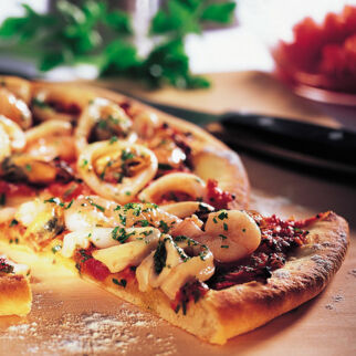 Pizza ai frutti die mare - Pizza mit Meeresfrüchten Pizza ai frutti die mare - Pizza mit Meeresfrüchten