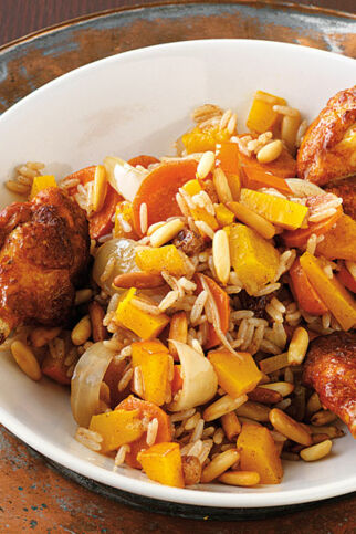 Orientalische Reispfanne mit Hähnchenflügeln Orientalische Reispfanne mit Hähnchenflügeln