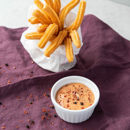 Metaxasauce mit Churros Metaxasauce mit Churros