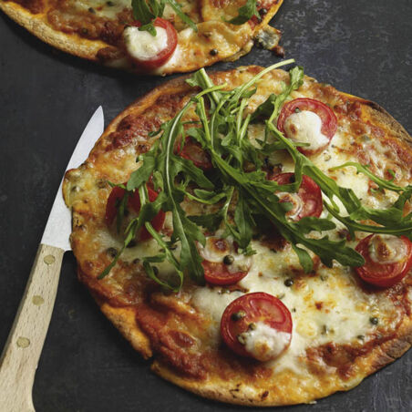 Tortilla-Pizza mit Rucola Tortilla-Pizza mit Rucola